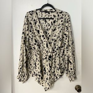 Cream and black print long sleeve vneck blouse